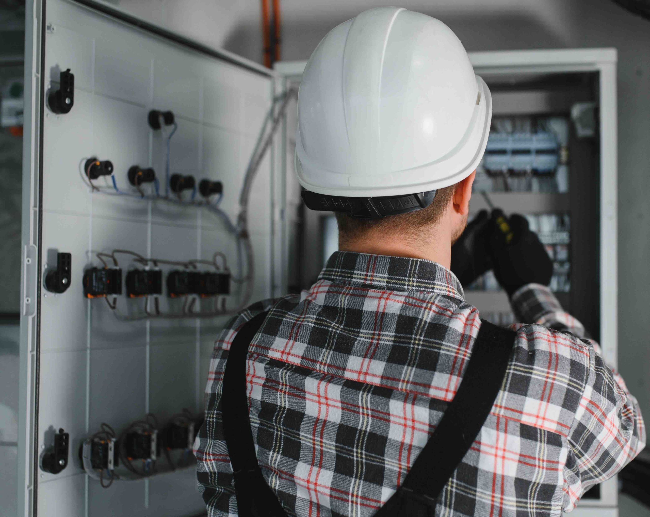 Electrician Installing Electrical Panel