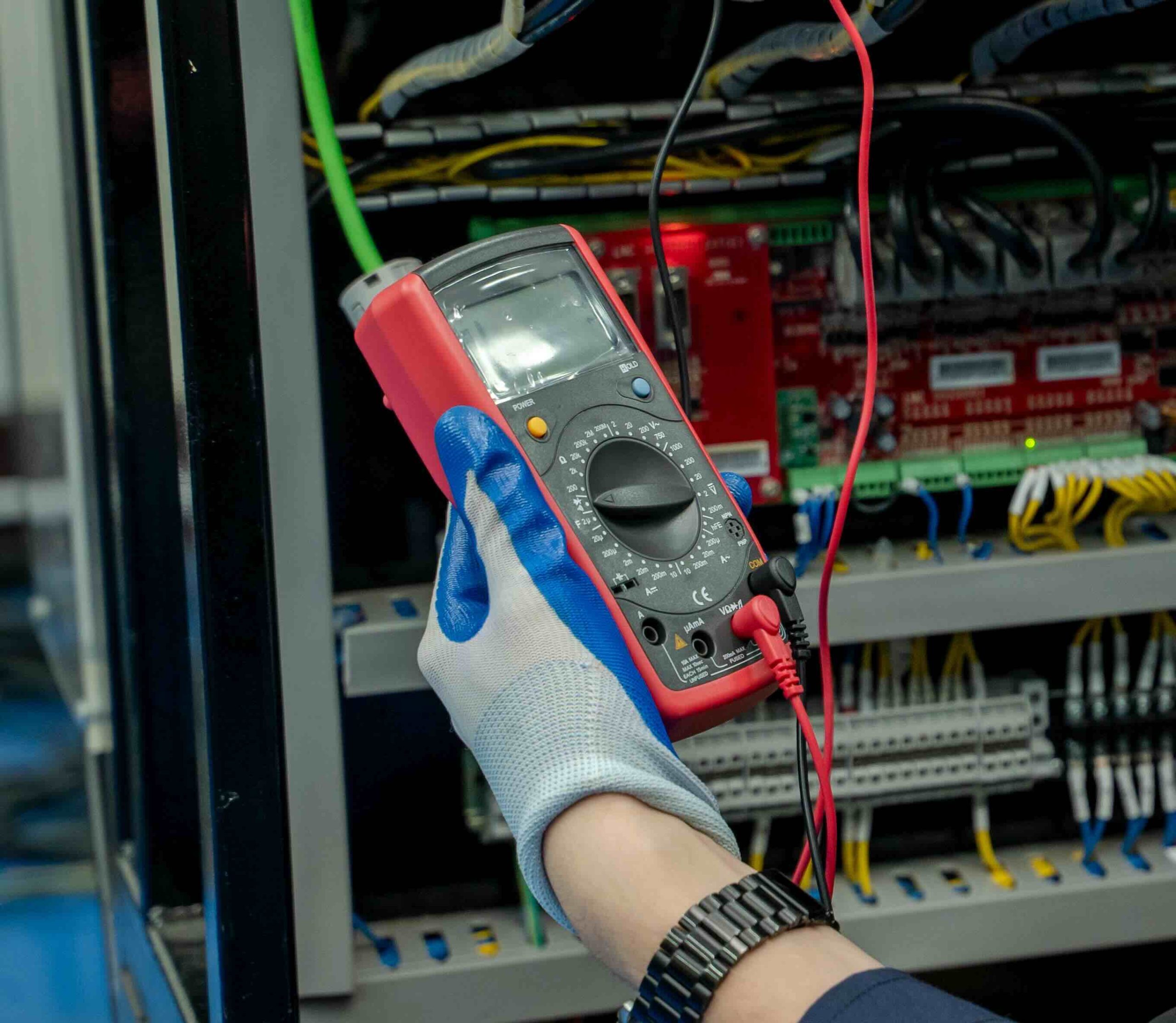ir testing A photo of an electrician rendering ir and arc flash testing services.