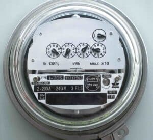 Photo of an electric meter, which registers less usage on homes that practice energy efficiency.
