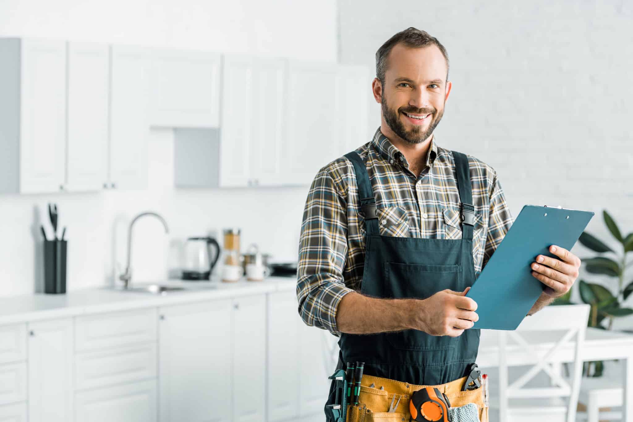 A photo of an electrician going through a checklist