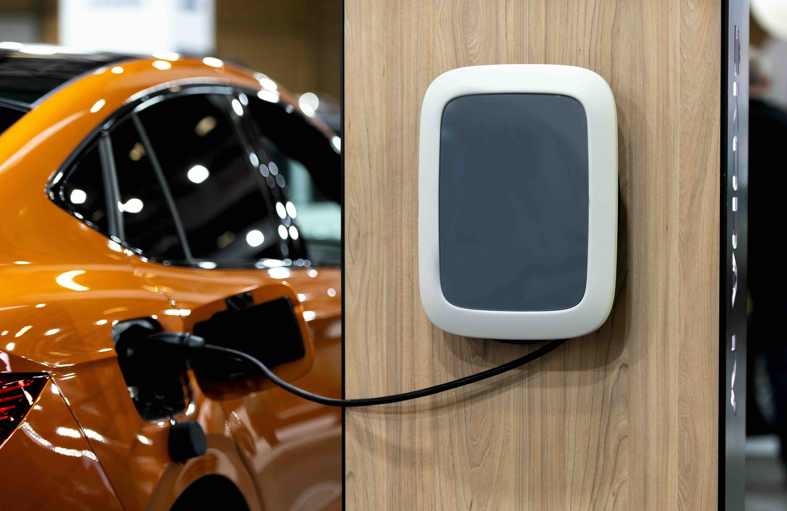 Photo of an ev charger installed in a home garage.